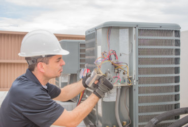 man repairing the breaker